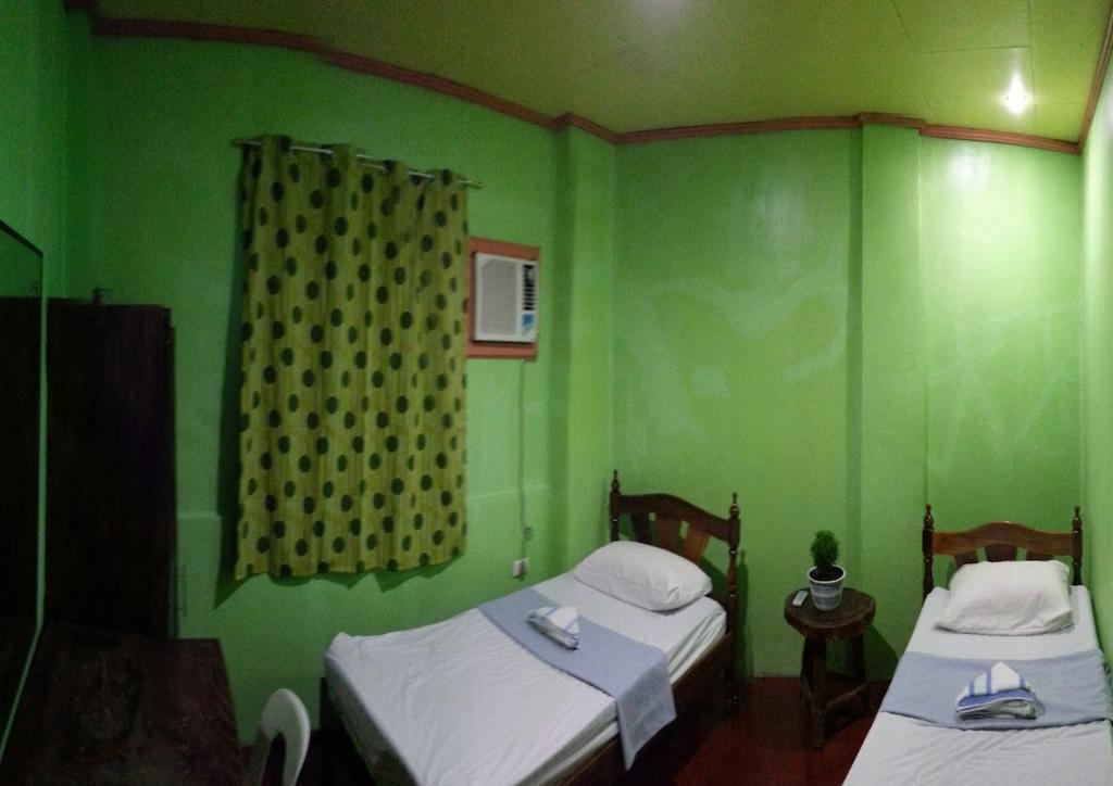 Dhayne Pension Puerto Princesa Habitación foto