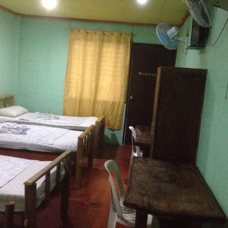Dhayne Pension Puerto Princesa Habitación foto