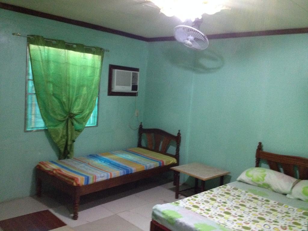 Dhayne Pension Puerto Princesa Habitación foto